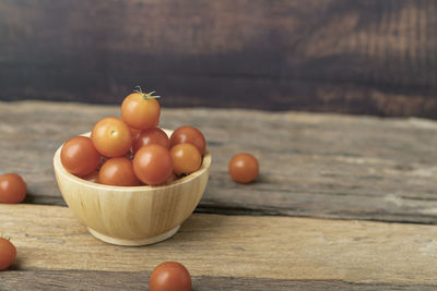 Close-up of fruits in bowl on table