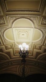 Low angle view of illuminated ceiling