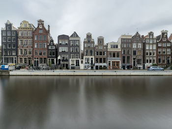 Buildings in city against sky