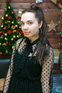 Portrait of young woman looking away