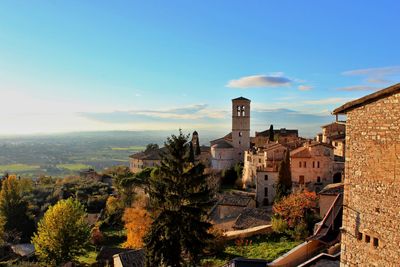 View of townscape against blue sky