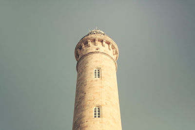 Low angle view of lighthouse against clear sky