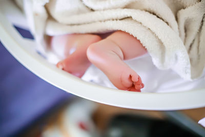 Cropped hand of person washing hands