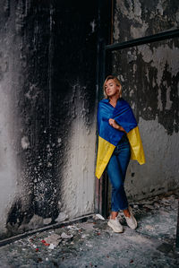 Girl holding the flag of ukraine