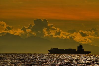 Scenic view of sea at sunset