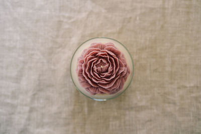 Candle in the shape of a rose. top view