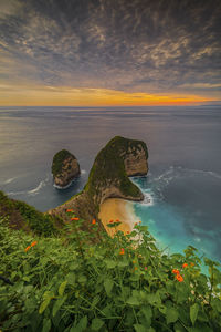 Scenic view of sea against sky during sunset