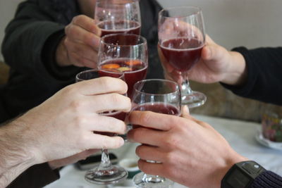 Friends toasting wineglasses in restaurant