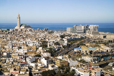 Elevated view of casablanca city with grand mosque and the atlantic