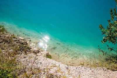 High angle view of sea and rocks