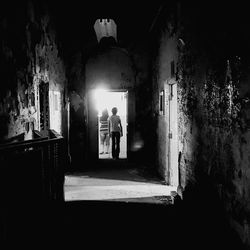 Low angle view of illuminated tunnel