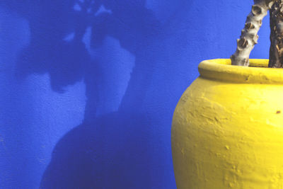 Close-up of yellow blue wall