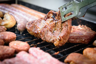 Close-up of meat on barbecue grill