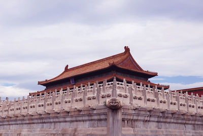 Low angle view of temple building against sky