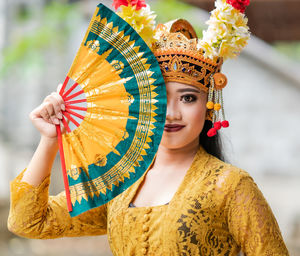 Portrait of young woman in traditional clothing