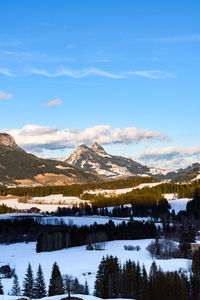 Scenic view of snowcapped mountains against sky