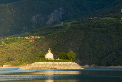 View of lake with mountain range in the background