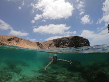 Man swimming in sea