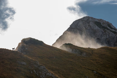 Scenic view of rocky mountains against sky