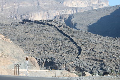 High angle view of man standing on rock