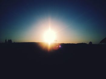 Scenic view of silhouette landscape against sky during sunset