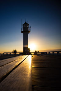 Scenic view of sea against clear sky during sunset