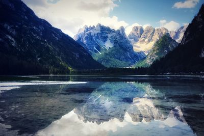 Scenic view of snowcapped mountains against sky