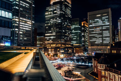 View of city lit up at night