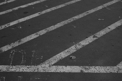 High angle view of arrow symbol on street