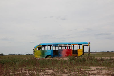 Abandoned hippie painted old bus