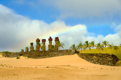 Ahu tongariki statues against rainbow