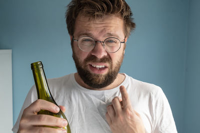 Portrait of man using mobile phone
