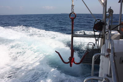 Nautical vessel sailing in sea against sky