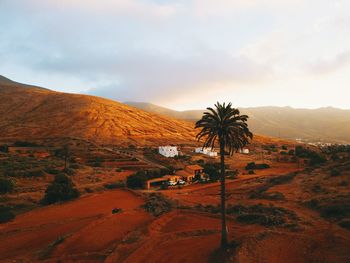 Scenic view of landscape against sky during sunset