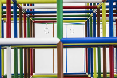 Close-up of multi colored books on shelf