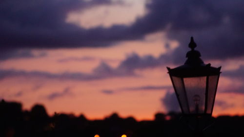 Close-up of silhouette plant against sky during sunset