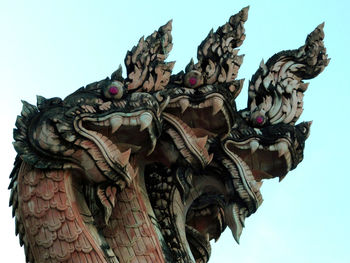 Low angle view of statue against clear sky