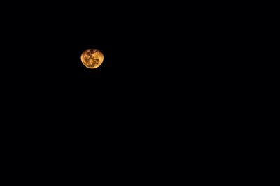 Scenic view of moon against sky at night