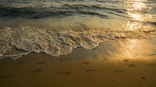 High angle view of sand at beach