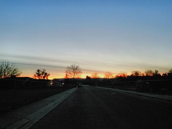 Empty road at sunset