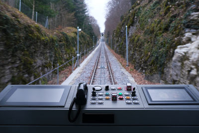 Railroad track seen through locomotive windshield