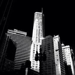 Low angle view of modern building at night