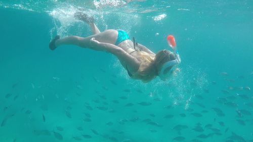 Man swimming in sea