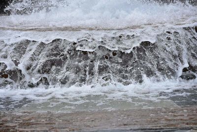 Sea waves splashing on shore