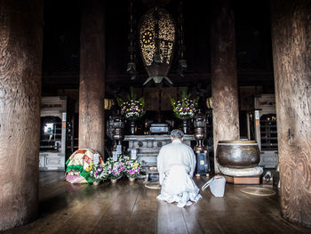 Rear view of people in temple