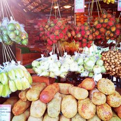 Various fruits for sale at market stall