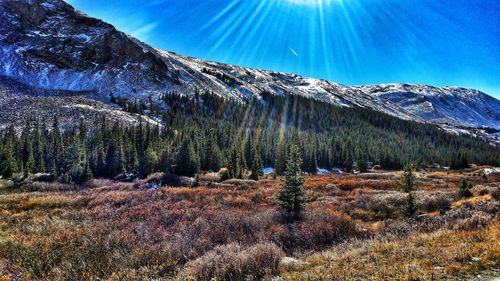 Scenic view of mountains against sky during winter