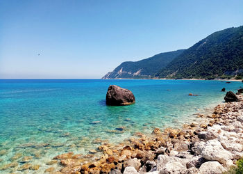 Scenic view of sea against clear sky