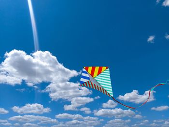 Low angle view of kite against sky