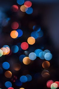 Defocused image of illuminated lights at night